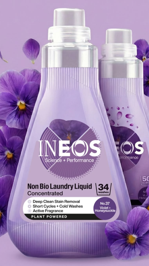 INEOS non-bio laundry liquid bottles with purple flowers on a purple background